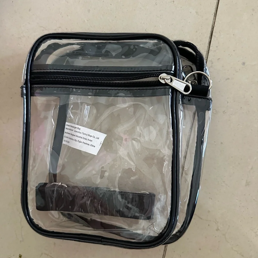 Clear Black Trim Crossbody Bag. Offers welcome